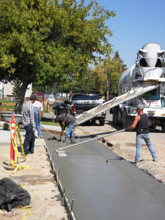 The last of the sidewalk concrete is in place...