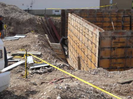 Basement wall forms in place, ready for concrete