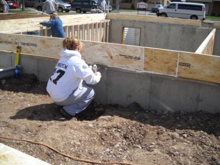 Caulking the rim joist