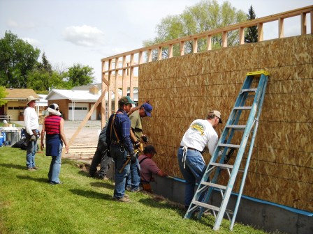 One work crew built garage wall framing, 