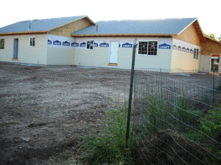 A volunteer equipment operator moved dirt