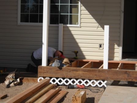 Volunteers working on the Build 24 front porch